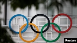The Olympic rings are seen at the Paris La Defense Arena in Nanterre, outside Paris