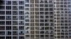 In this photo taken Oct. 30, 2008, offices and apartment buildings are shown in Beijing, China. In the sprawling megacities of Beijing, Shanghai and Chongqing, where populations exceed 10 million people, extreme urban density means that the number of peop
