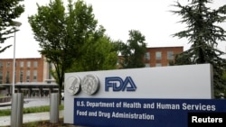 Signage is seen outside of FDA headquarters in White Oak, Maryland
