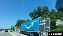 An Amazon prime truck travels on Interstate highway in Fairfax, Virginia, July 14, 2019. (photo: Diaa Bekheet)