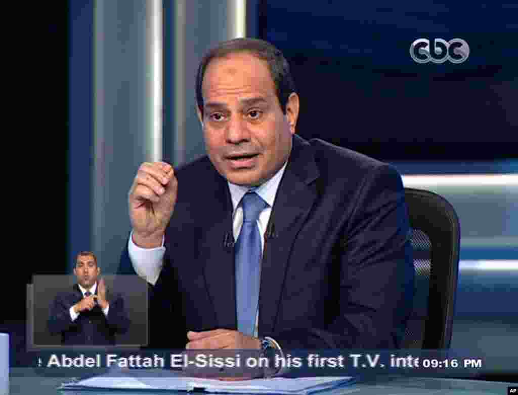 Former army chief Abdel-Fattah el-Sissi listens to a question during an interview in a nationally televised program on Egypt's State Television, in Cairo, May 5, 2014.