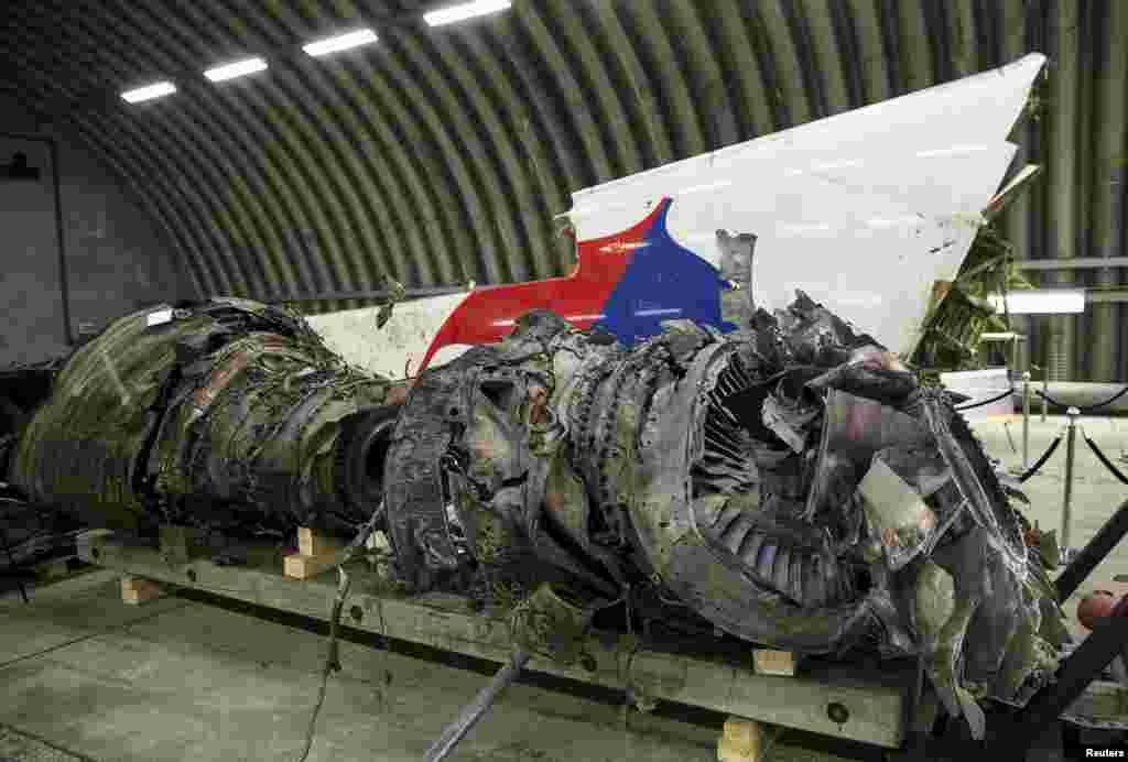 Wreckage of the MH17 airplane is seen after the presentation of the final report into the crash of July 2014 of Malaysia Airlines flight MH17 over Ukraine in Gilze Rijen, the Netherlands, October 13, 2015.