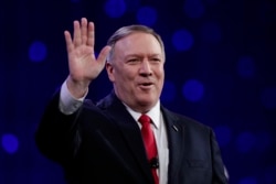 FILE - Secretary of State Mike Pompeo waves to the crowd before speaking at the 101st National Convention of The American Legion in Indianapolis, Aug. 27, 2019.