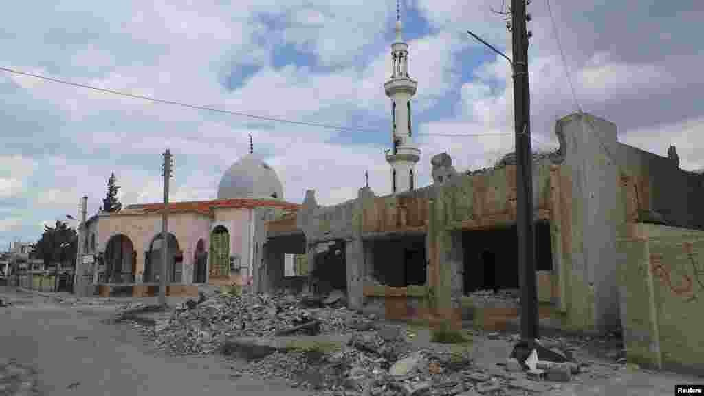 Damaged mosques and properties activists said were hit by shelling by forces loyal to Syria's President Bashar al-Assad, in Daraa, April 10, 2013.