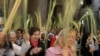 Christian worshippers hold palm fronds during the Palm Sunday procession in the Church of the Holy Sepulchre in Jerusalem's Old City, April 13, 2014.