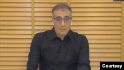 FILE - Undated social media photo of Reza Valizadeh, a former Radio Farda journalist and Iranian American dual citizen reportedly arrested in Iran in September 2024.