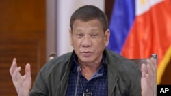 FILE - Philippine President Rodrigo Duterte discusses issues related to the new coronavirus, in Panacan, Davao City, southern Philippines, July 7, 2020.