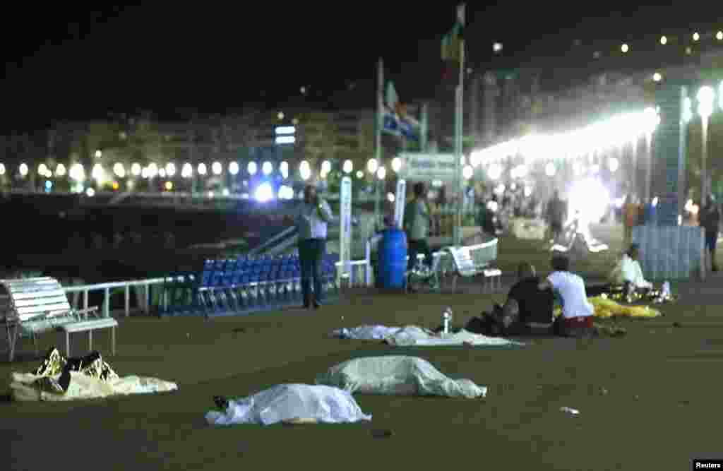 Bodies are seen on the ground after a truck ran into a crowd celebrating the Bastille Day national holiday in Nice, France, July 14, 2016.
