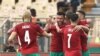 Des joueurs marocains célèbrent après avoir marqué le premier but lors du match de football du Groupe C de la Coupe d'Afrique des Nations (CAN) 2021 entre le Maroc et les Comores au Stade Ahmadou Ahidjo à Yaoundé le 14 janvier 2022. 