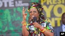 FILE - Grace Mugabe, addresses party supporters at a ZANU-PF Rally in Chinhoyi, July 29, 2017.