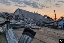 A granary destroyed in a Russian drone attack at night is seen in a Danube port near Odesa, Ukraine, Aug. 16, 2023.