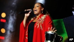 FILE - Queen Latifah performs at the 2018 Essence Festival at the Mercedes-Benz Superdome in New Orleans, Louisiana, July 7, 2018. Latifah will host the 2018 Black Girls Rock awards, which will be taped Aug. 26 at the New Jersey Performing Arts Center in Newark.