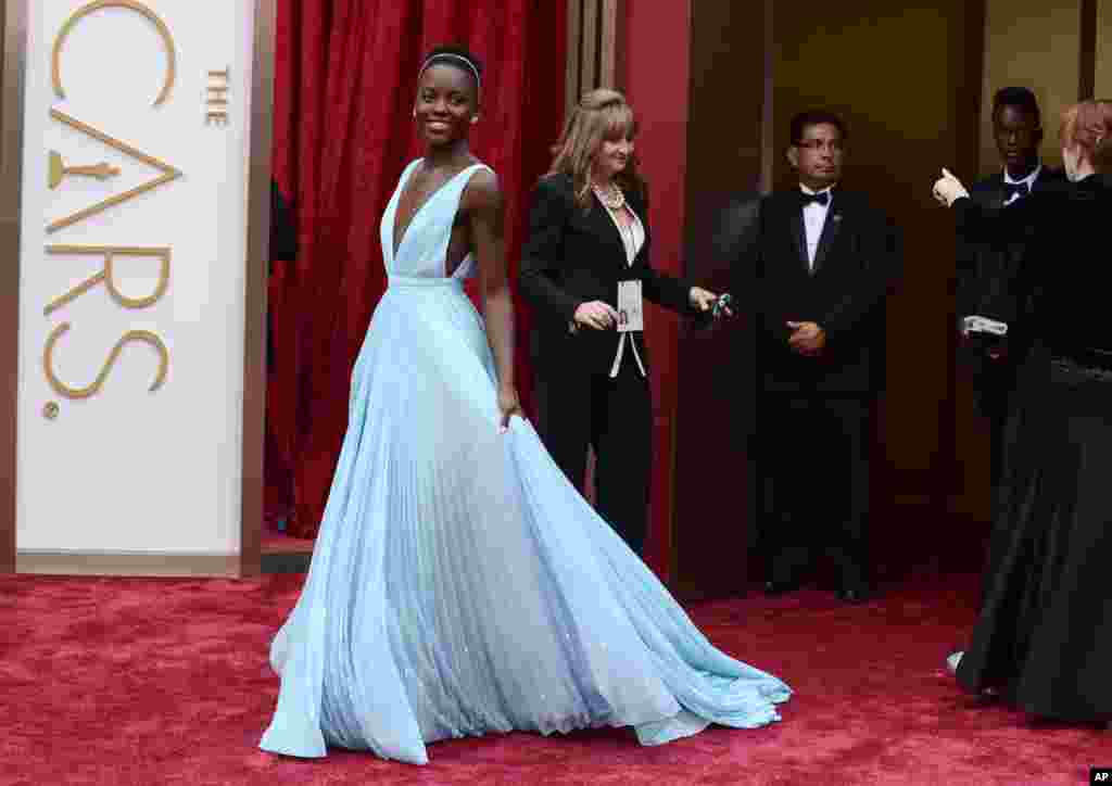 Lupita Nyong'o arrives at the Oscars on March 2, 2014, at the Dolby Theatre in Los Angeles.