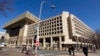 FBI Agent at Center of Clinton Email Probe Controversy Escorted From Building 