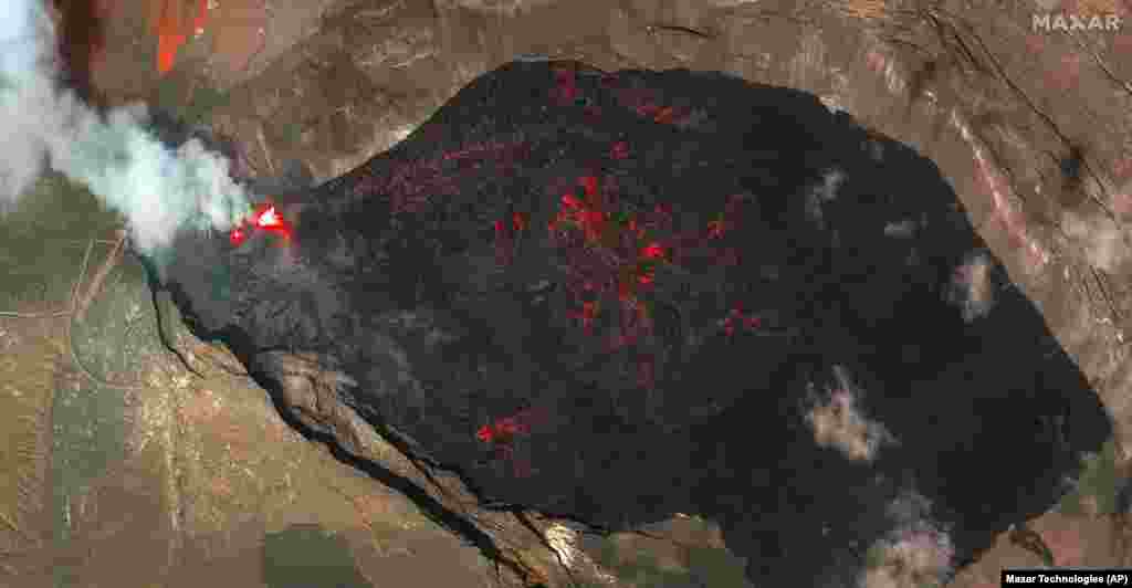 This infrared satellite image provided by MAXAR, Dec. 25, 2024, shows Hawaii’s Kilauea volcano erupting. 