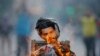 Venezuelan Protesters Burn Leaders in Effigy