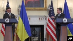 U.S. Secretary of State Antony Blinken, right, and Ukraine's Foreign Minister Dmytro Kuleba hold a news conference following U.S.-Ukraine Strategic Dialogue talks at the State Department in Washington, Nov. 10, 2021. 