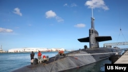 美國海軍俄亥俄級內華達號核潛艇（SSBN-733）1月15日現身關島海軍基地。 （照片來自美國海軍推特）