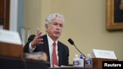 FILE - CIA Director William Burns gestures as he speaks during a House Intelligence Committee hearing on worldwide threats in Washington, Apr. 15, 2021. 