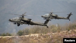 미 육군 AH-64 아파치 공격헬기 부대가 한국 포천 사격장에서 열린 미한 실사격훈련에 참가했다. (자료사진)