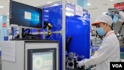 Technicians are examining the results of Air Blower testing - a very important step that determines the quality of the ventilator.