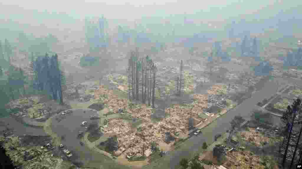 This aerial image shows a neighborhood that was destroyed by a wildfire in Santa Rosa, Calif., Oct. 10, 2017. Newly homeless residents of California wine country took stock of their shattered lives Tuesday.