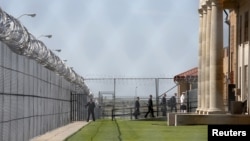 In pushing criminal justice reform, U.S. President Barack Obama (not shown) and aides visit El Reno Federal Correctional Institution in Oklahoma, July 16, 2015. 