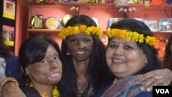 Laxmi Agarwal (center), an icon among acid attack survivors, says they too have a right to hopes and dreams. (A. Pasricha for VOA)
