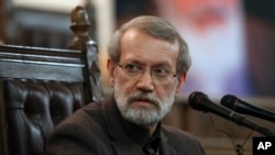 Parliament Speaker Ali Larijani gives a press conference in Tehran, Iran, Dec. 1, 2019.