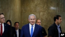 srael's Prime Minister Benjamin Netanyahu arrives for the weekly Cabinet meeting in Jerusalem, July 14, 2019. 