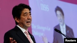 日本首相安培在新加坡召开的第十三届亚洲安全峰会发表开幕演讲（2014年5月30）