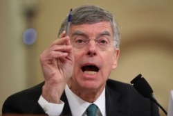 FILE - Top U.S. diplomat in Ukraine William Taylor testifies before the House Intelligence Committee on Capitol Hill in Washington, Nov. 13, 2019.