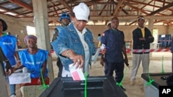 Nobel Peace Prize Laureate Ellen Johnson Sirleaf, who is also Liberia's incumbent president, votes in Feefee in Bomi County, Liberia, October 11, 2011.