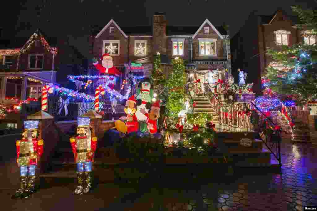 A house in the Dyker Heights neighborhood of Brooklyn is seen lit up with Christmas decorations in New York, Dec. 23, 2013.