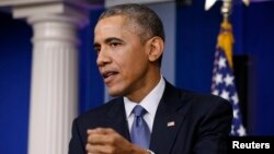 President Barack Obama answers questions during a press conference in the briefing room of the White House, Dec. 19, 2014. 