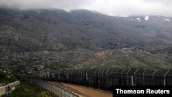 ences are seen on the ceasefire line between Israel and Syria in the Israeli-occupied Golan Heights, Oct. 28, 2020.