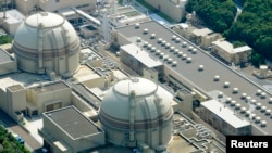 FILE - An aerial view shows Kansai Electric Power Co's Ohi nuclear power plant's No. 4 reactor (front) in Ohi, Fukui prefecture.