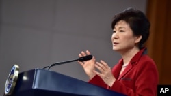 South Korean President Park Geun-hye speaks during her New Year's press conference at the presidential Blue House in Seoul Monday, Jan. 12, 2015.