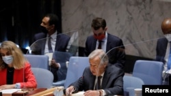 FILE - United Nations Secretary-General Antonio Guterres addresses the U.N. Security Council at the United Nations in New York City, Aug. 16, 2021. 