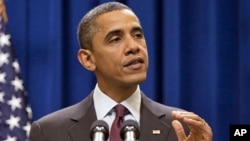 President Barack Obama gestures during a statement on the US-Korea Free Trade Agreement in Washington, 04 Dec. 2010