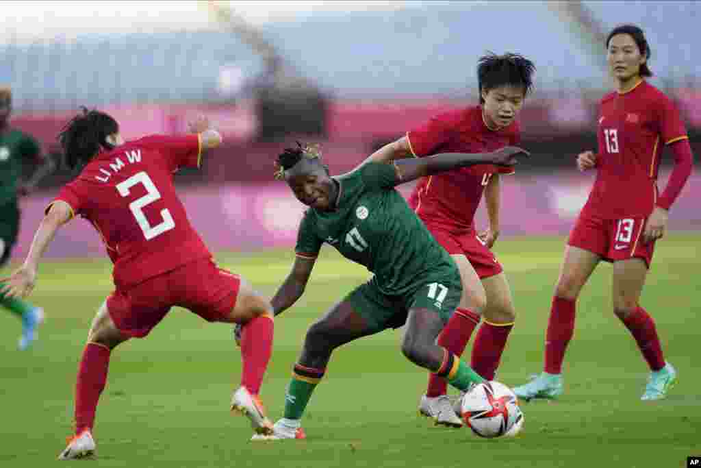Zambia's Racheal Kundananji controls the ball during a women's soccer match against China at the 2020 Summer Olympics, Saturday, July 24, 2021, in Miyagi, Japan. (AP Photo/Andre Penner)