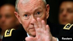 U.S. Chairman of the Joint Chiefs of Staff Gen. Martin Dempsey testifies at a Senate hearing on Capitol Hill in Washington Jun. 11, 2013. 