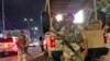 Iraqi security forces stand guard near the Bahraini Embassy in Baghdad, Iraq, June 27, 2019. Demonstrators were protesting a conference aimed at promoting Arab-Israeli peace.