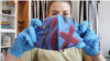 "De primera necesidad": diseñadora venezolana va de la alta costura a fabricar tapabocas para la comunidad