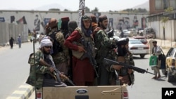 Taliban fighters patrol in Kabul, Afghanistan, Aug. 19, 2021.