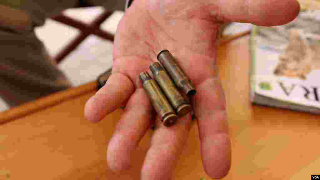 Martin Evans, owner of Ol Maisor ranch, shows shell casings he found on his property in Laikipia, Kenya, March 16, 2017. (Jill Craig/VOA)