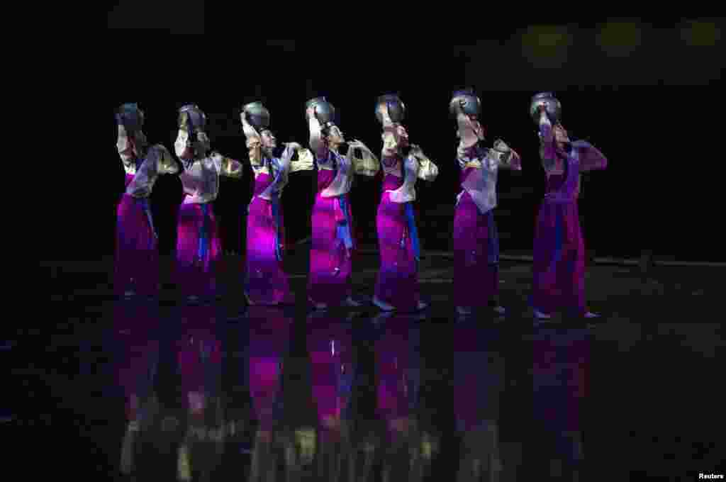 North Korean artists from Pyongyang rehearse for an evening dancing performance called "Azalea" during the 13th Asian Arts Festival in Kunming, Yunnan province, China.