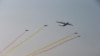 Des avions militaire survolent la capitale de la Birmanie, Naypyitaw, le 27 mars 2017.
