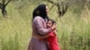 Lebanon's Hezbollah fires dozens of rockets at Israeli kibbutz