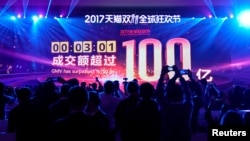 A screen shows the value of goods being transacted at Alibaba Group's 11.11 Singles Day global shopping festival in Shanghai, China, Nov. 11, 2017.